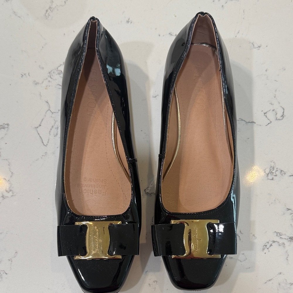 Glossy Black Women's Loafers with Gold Accent
